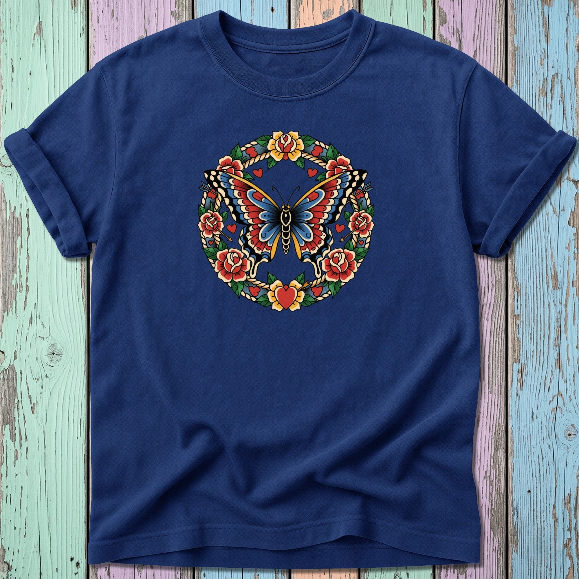 Navy t-shirt with a circular floral and heart design featuring a butterfly.