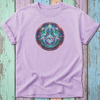 Purple t-shirt with a Hamsa hand, eye, and lotus flower graphic reading "SAFE, LOVED, PROTECTED."