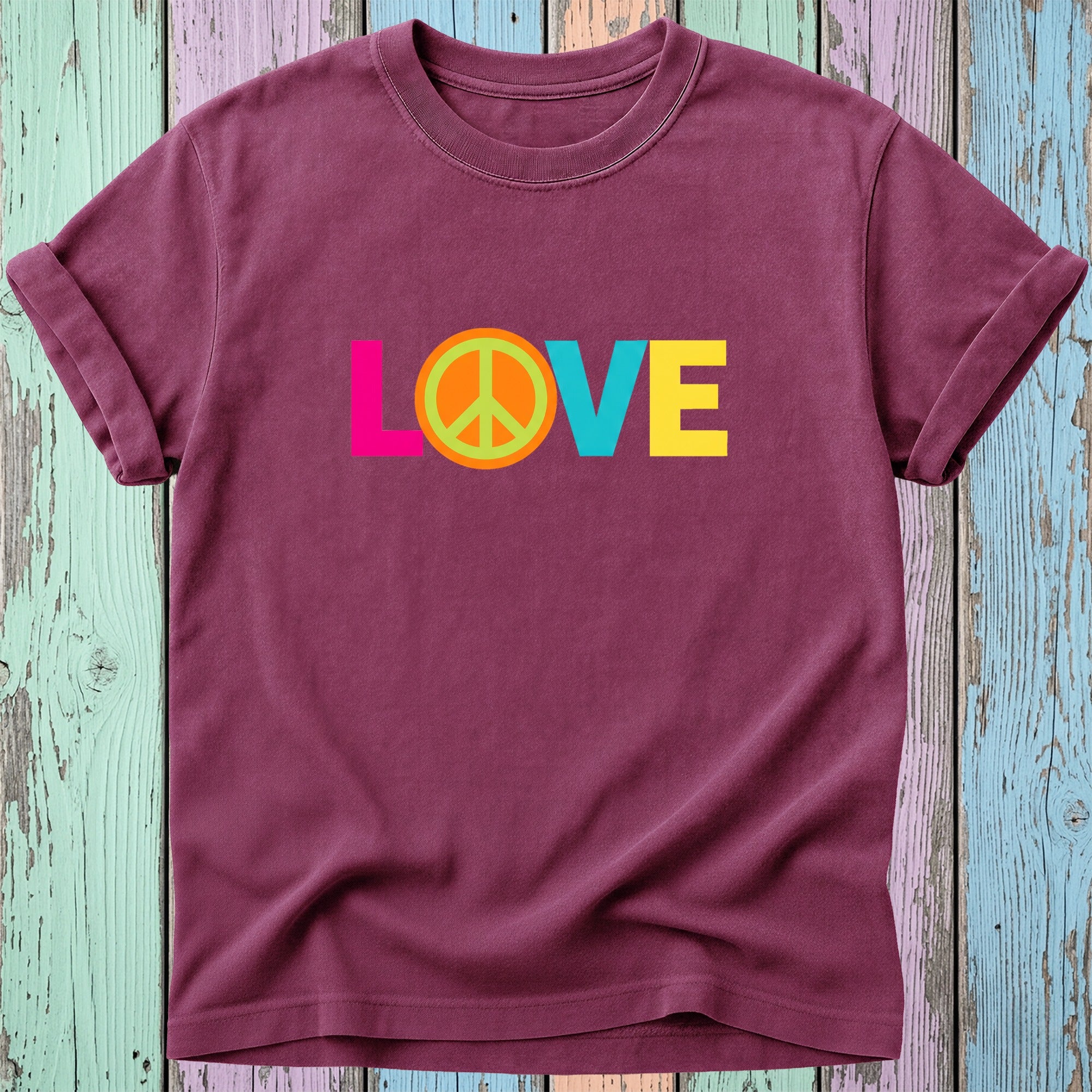 Burgundy t-shirt with "LOVE" in colorful block letters and a peace sign.