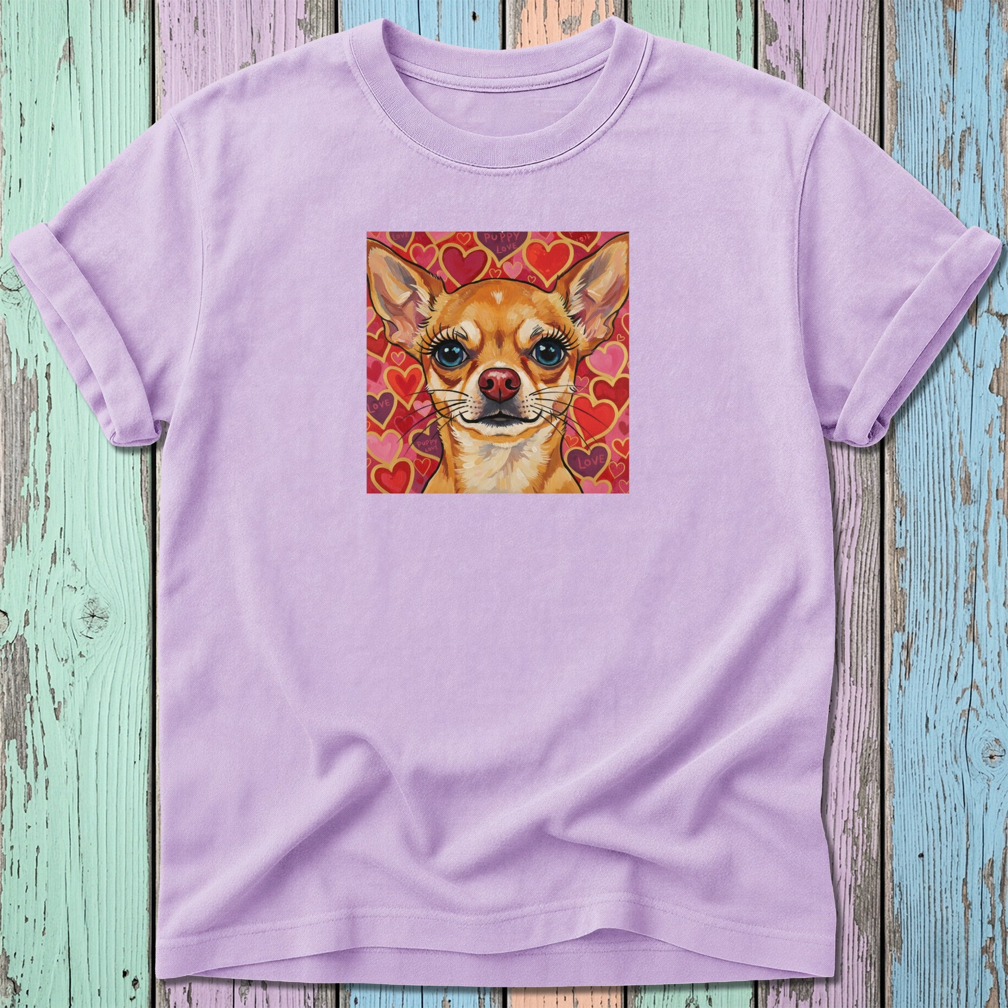 Chihuahua portrait with hearts and swirling patterns on a lavender t-shirt.