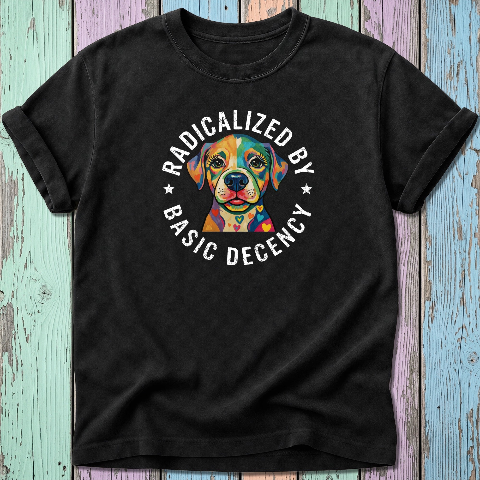 Black t-shirt with colorful dog graphic and "Radicalized by Basic Decency" text.