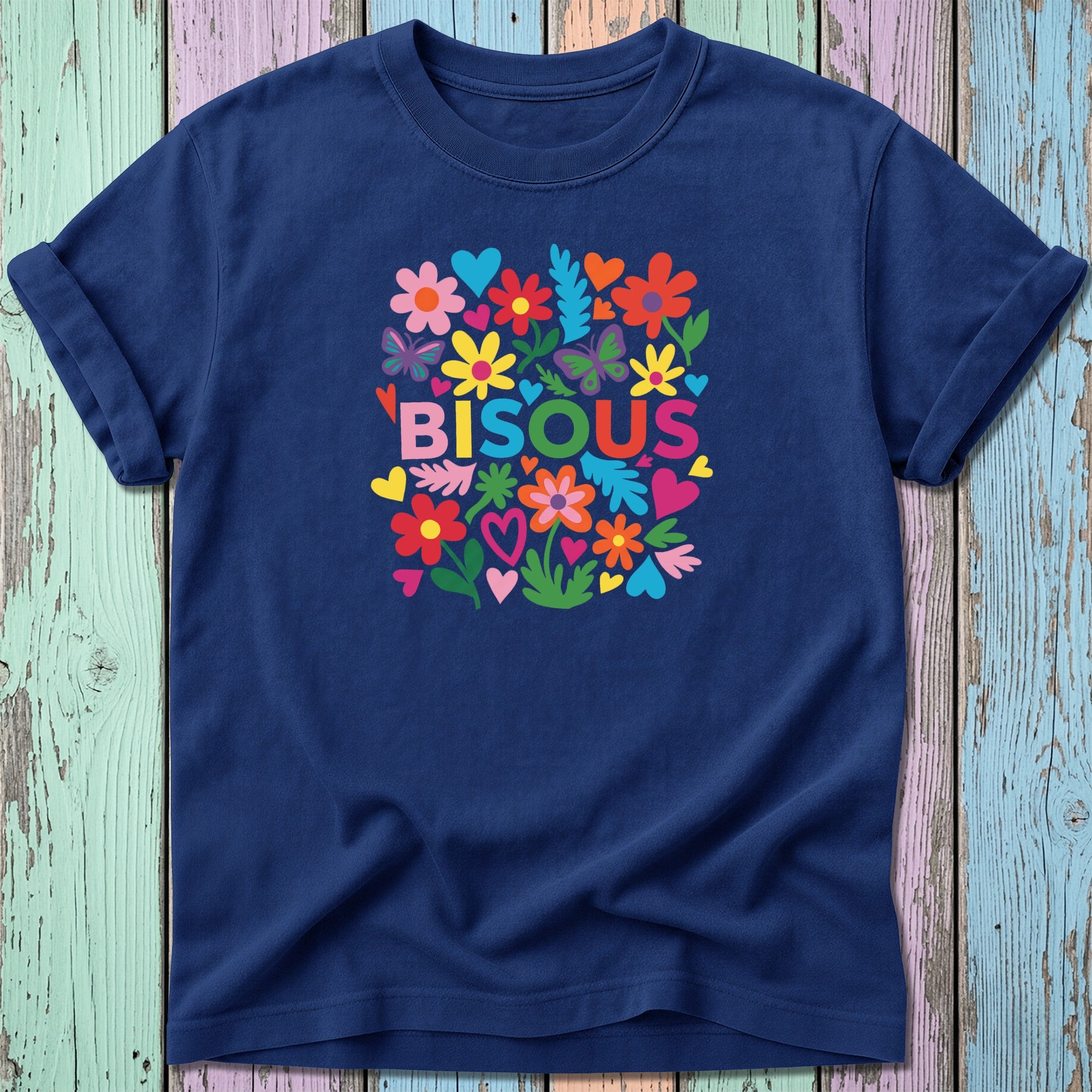 Navy t-shirt with "BISOU" text surrounded by colorful flowers and hearts.