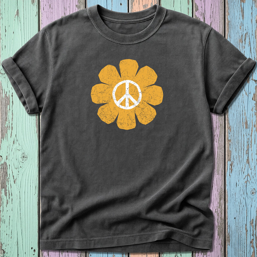 Distressed yellow peace sign flower graphic on a dark grey t-shirt.