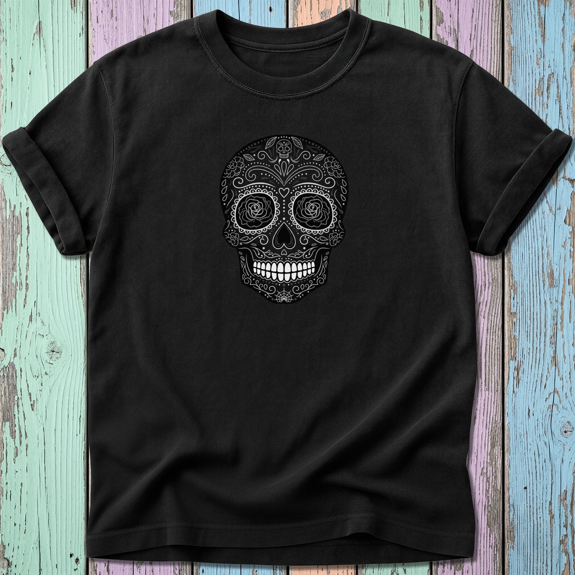 Black t-shirt featuring a white ornamental skull design.