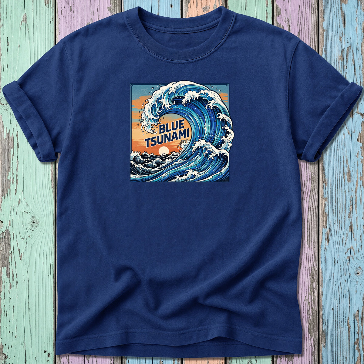 A navy blue t-shirt with a square graphic of a crashing ocean wave and the text BLUE TSUNAMI.