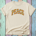 Cream t-shirt with "PEACE" in a colorful floral graphic.