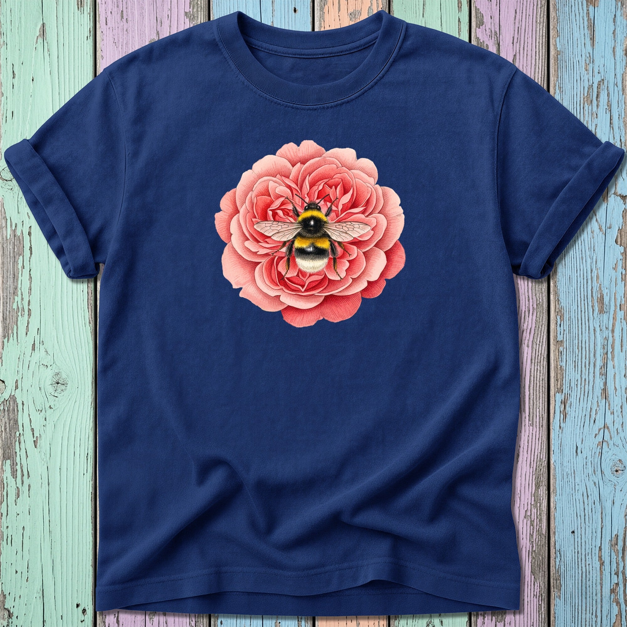 Navy t-shirt with a bumblebee on a large pink rose.
