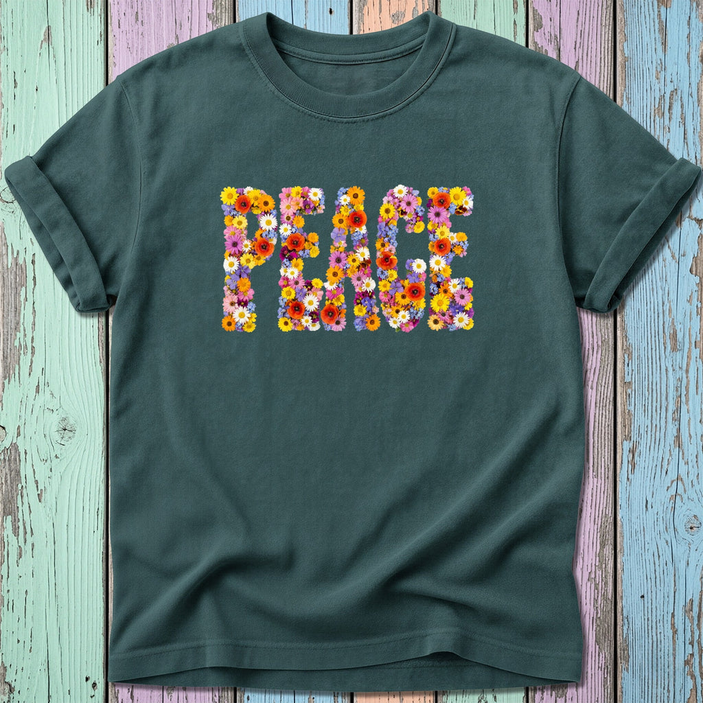 Dark green t-shirt with the word PEACE formed from colorful flowers.