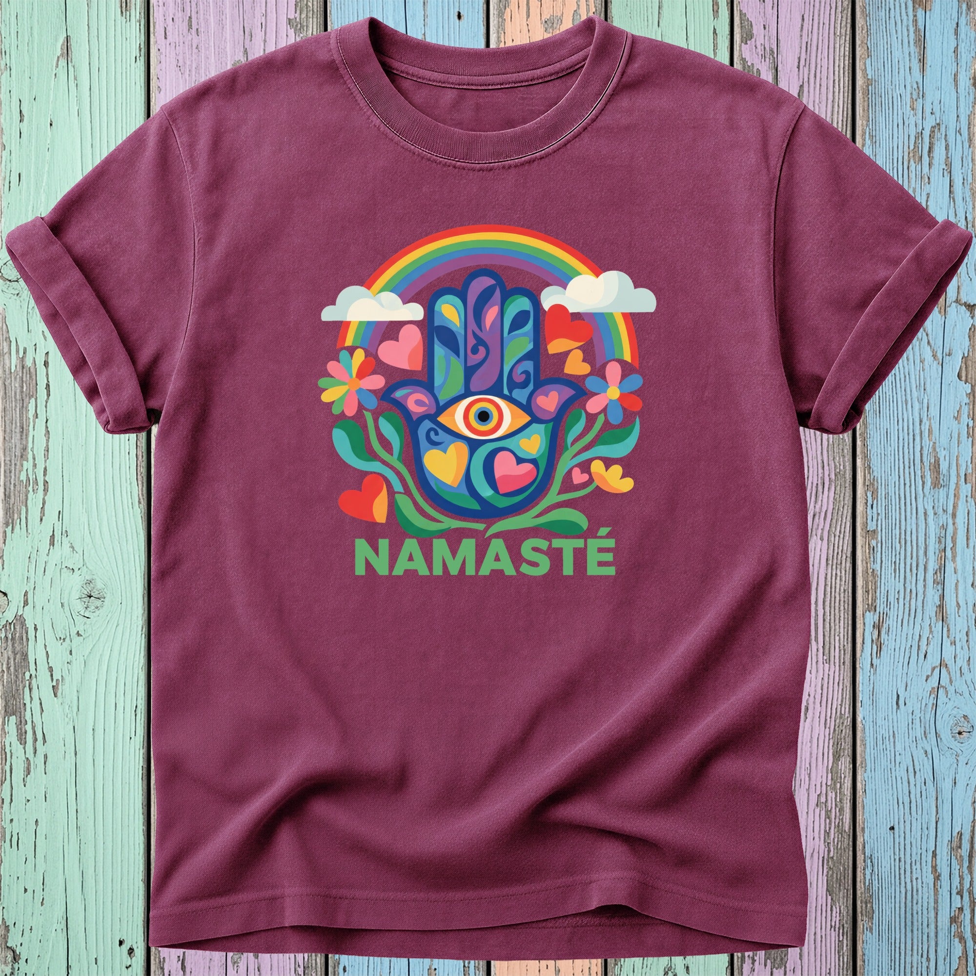 Maroon t-shirt with rainbow, Hamsa hand, and "Namaste" text.