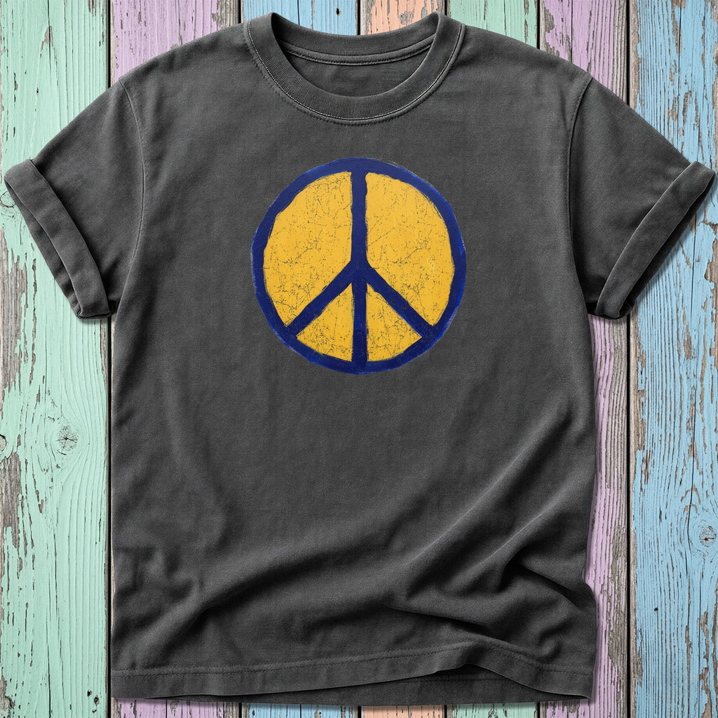 Dark grey t-shirt with distressed yellow peace symbol on blue background.