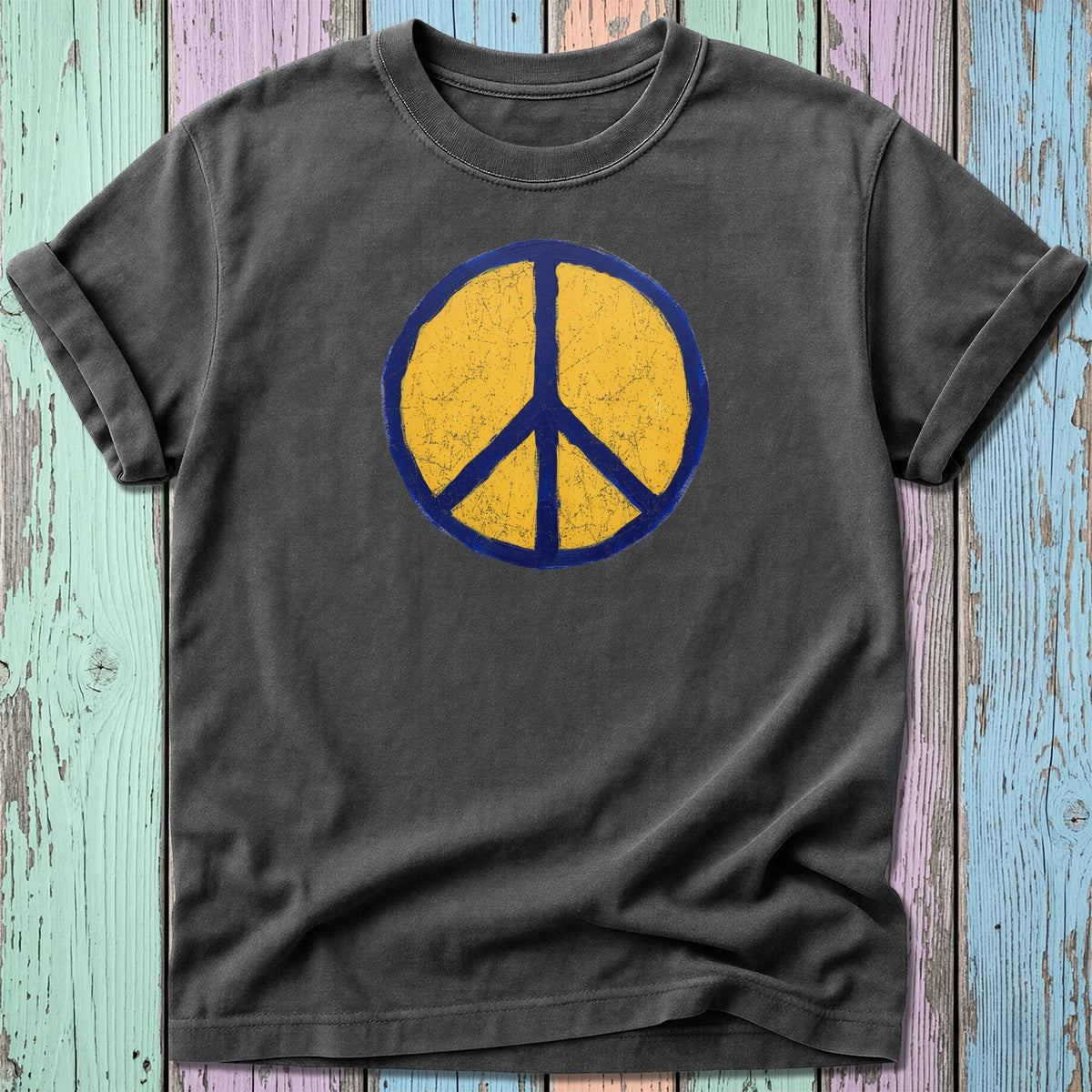Dark grey t-shirt with distressed yellow peace symbol on blue background.