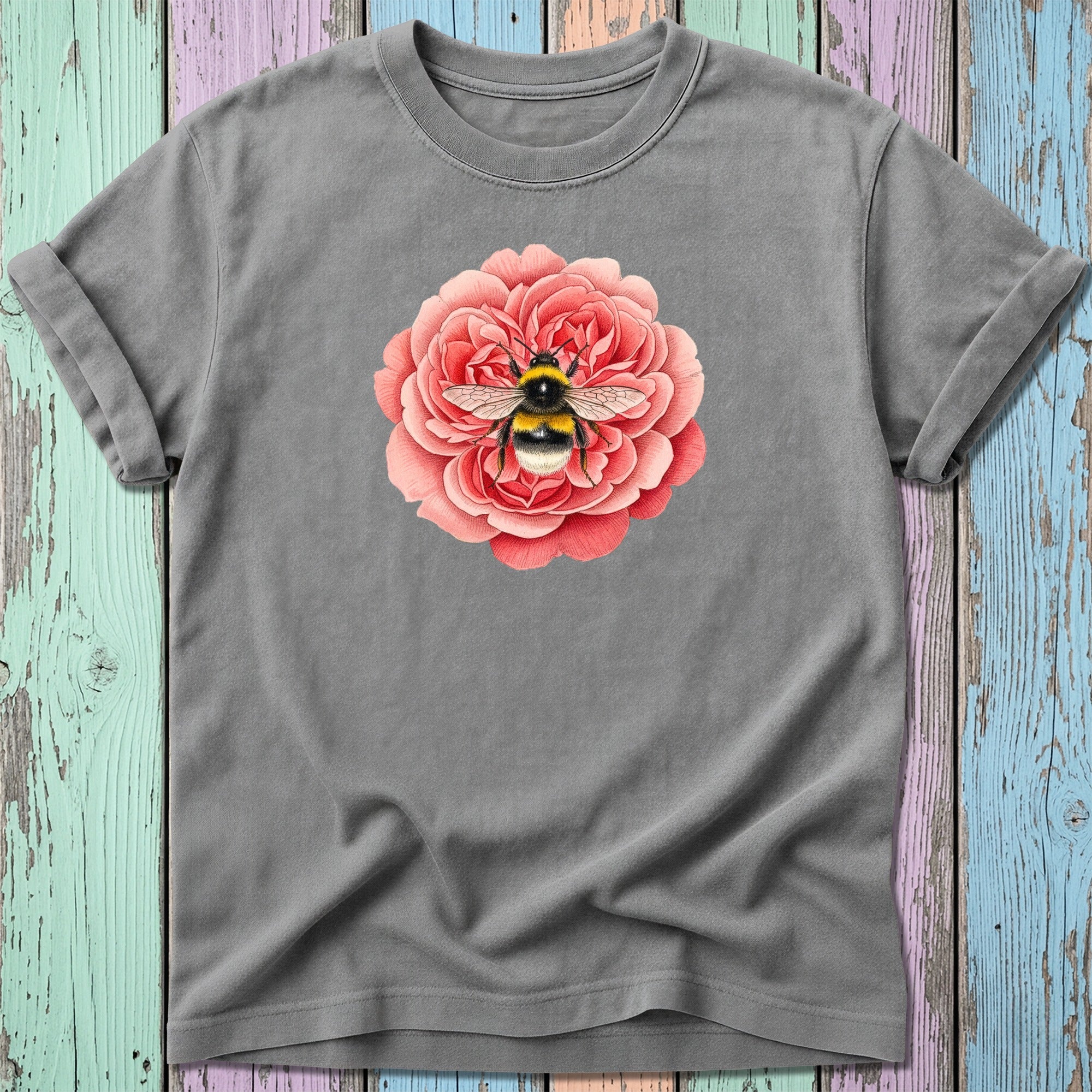Gray t-shirt with a close-up illustration of a bee on a pink rose.