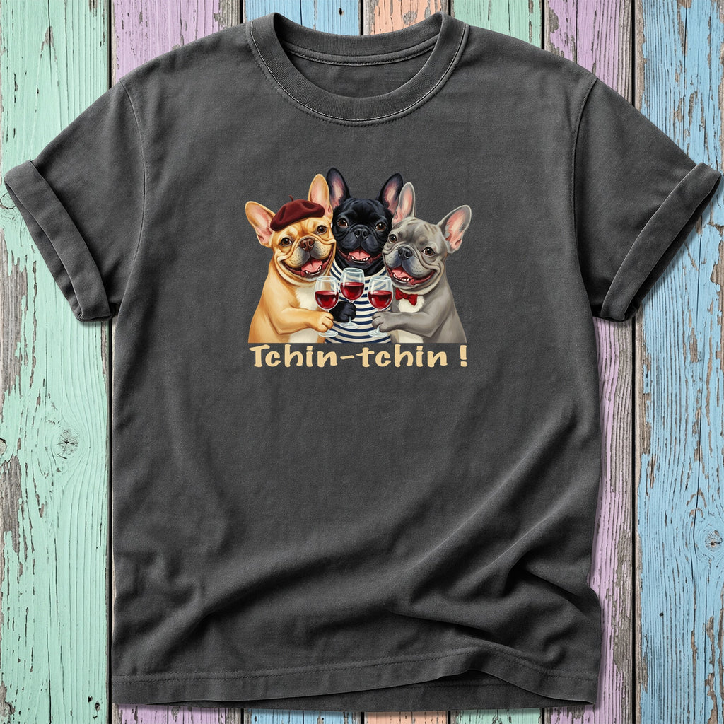 Three French Bulldogs in hats clink glasses of wine, text reads "Tchin-tchin!"