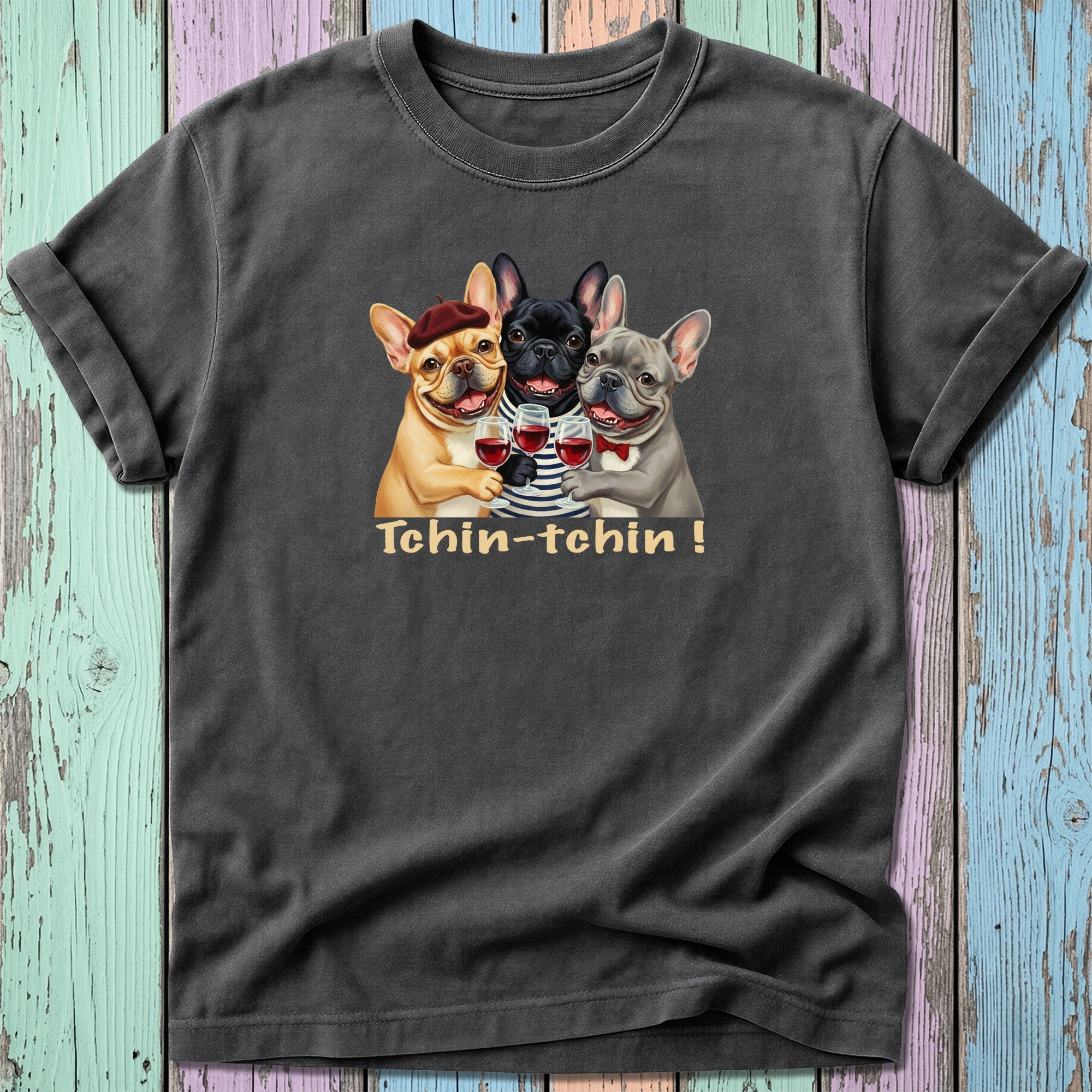 Three French Bulldogs in hats clink glasses of wine, text reads "Tchin-tchin!"