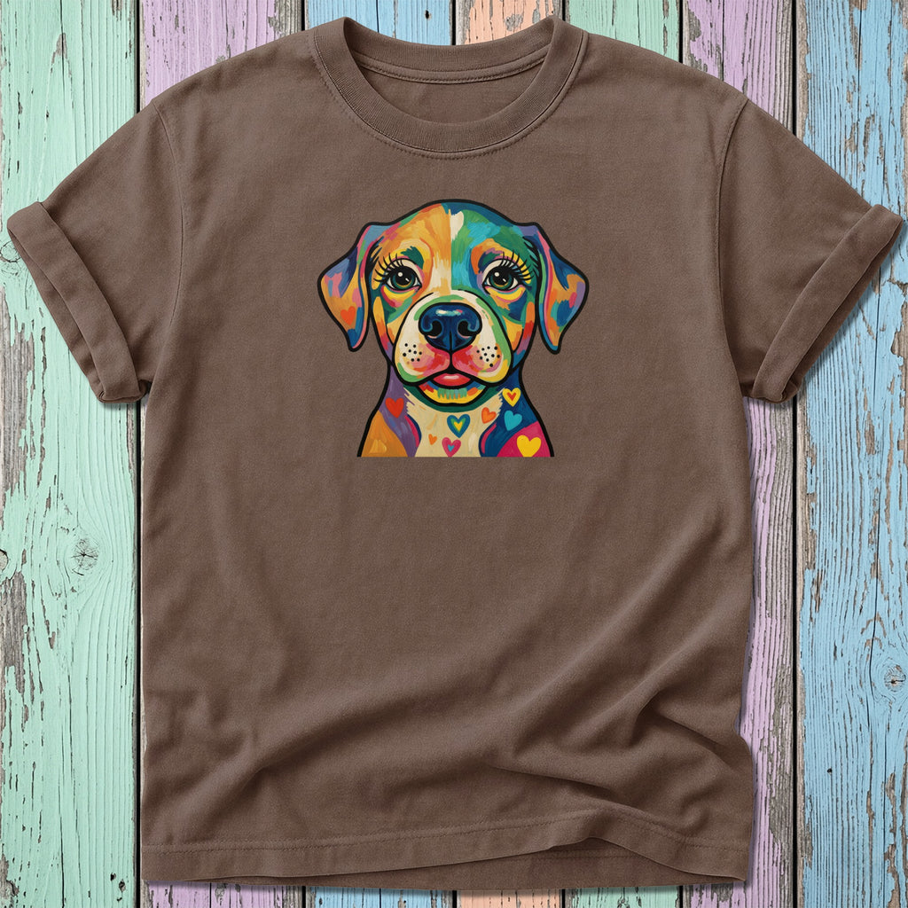 Brown t-shirt with colorful dog face design and hearts.