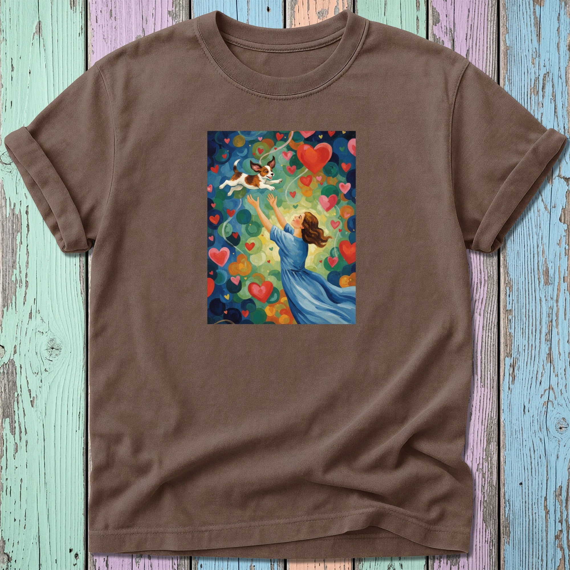 Woman in blue dress reaching for flying dog with hearts and abstract shapes.