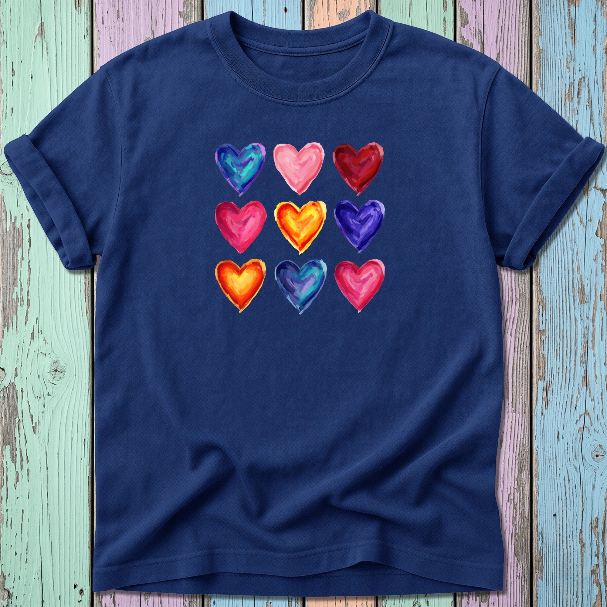 Dark blue t-shirt featuring a grid of nine colorful watercolor hearts.