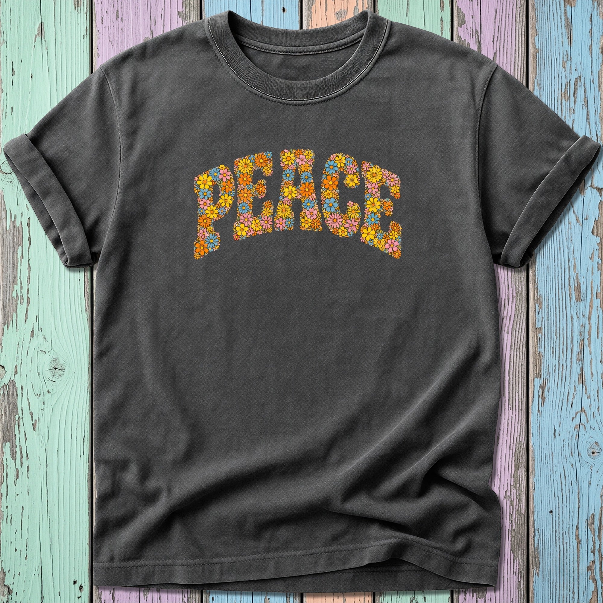 Gray t-shirt with "PEACE" spelled out in colorful floral letters.