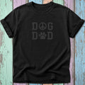 Black t-shirt with dog peace and paw print design on distressed wood background.