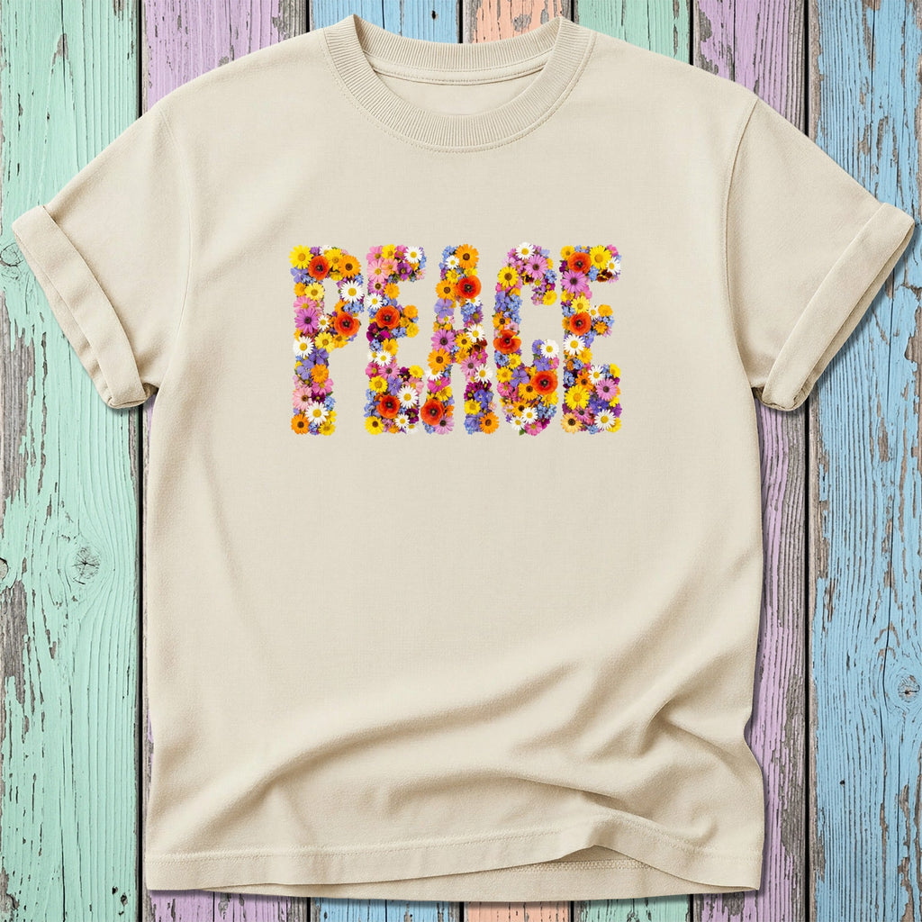 Cream t-shirt with "PEACE" spelled out in colorful flowers.