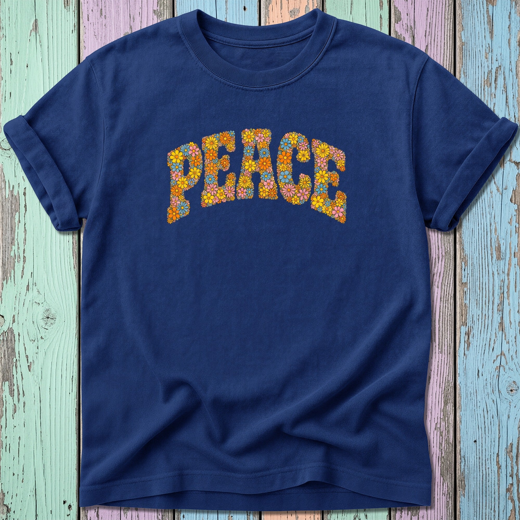 Navy t-shirt with "PEACE" in colorful floral block letters.