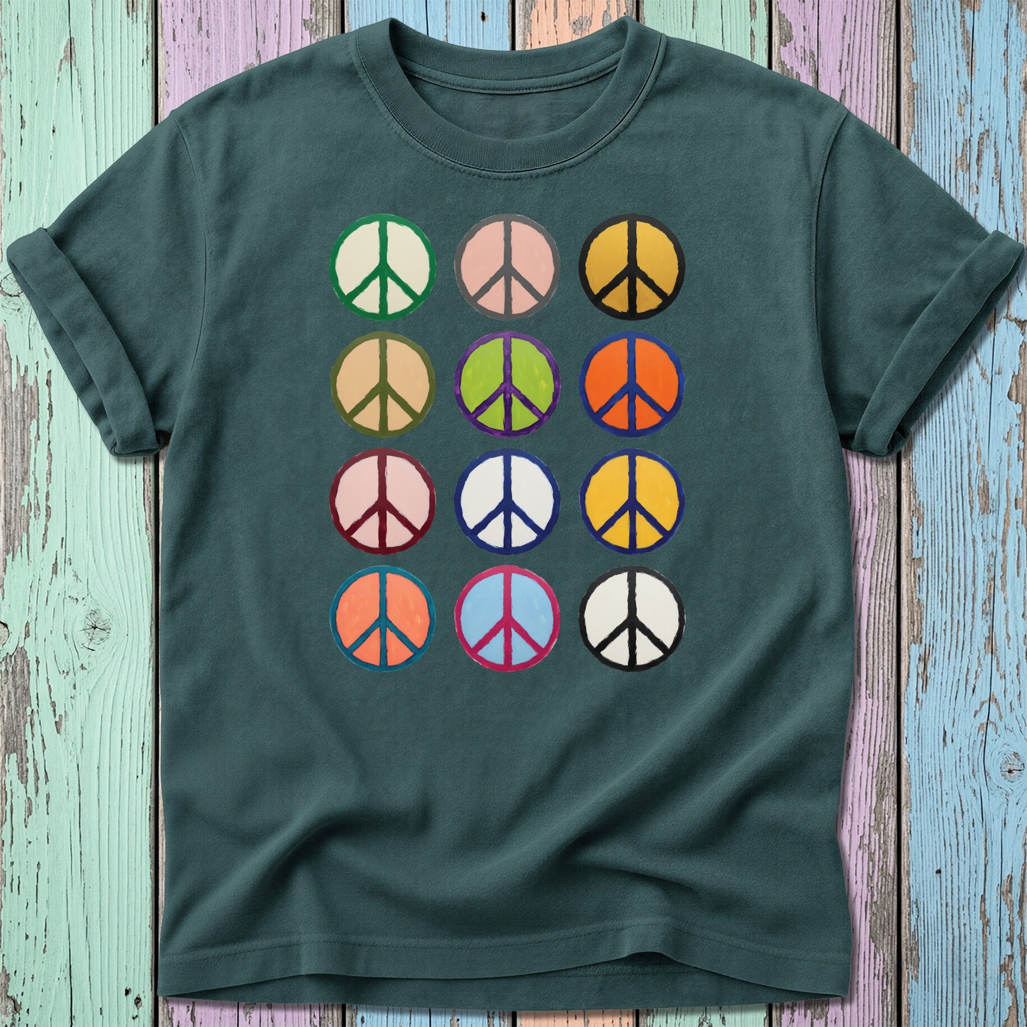 T-shirt with a grid of colorful peace signs in various pastel colors.
