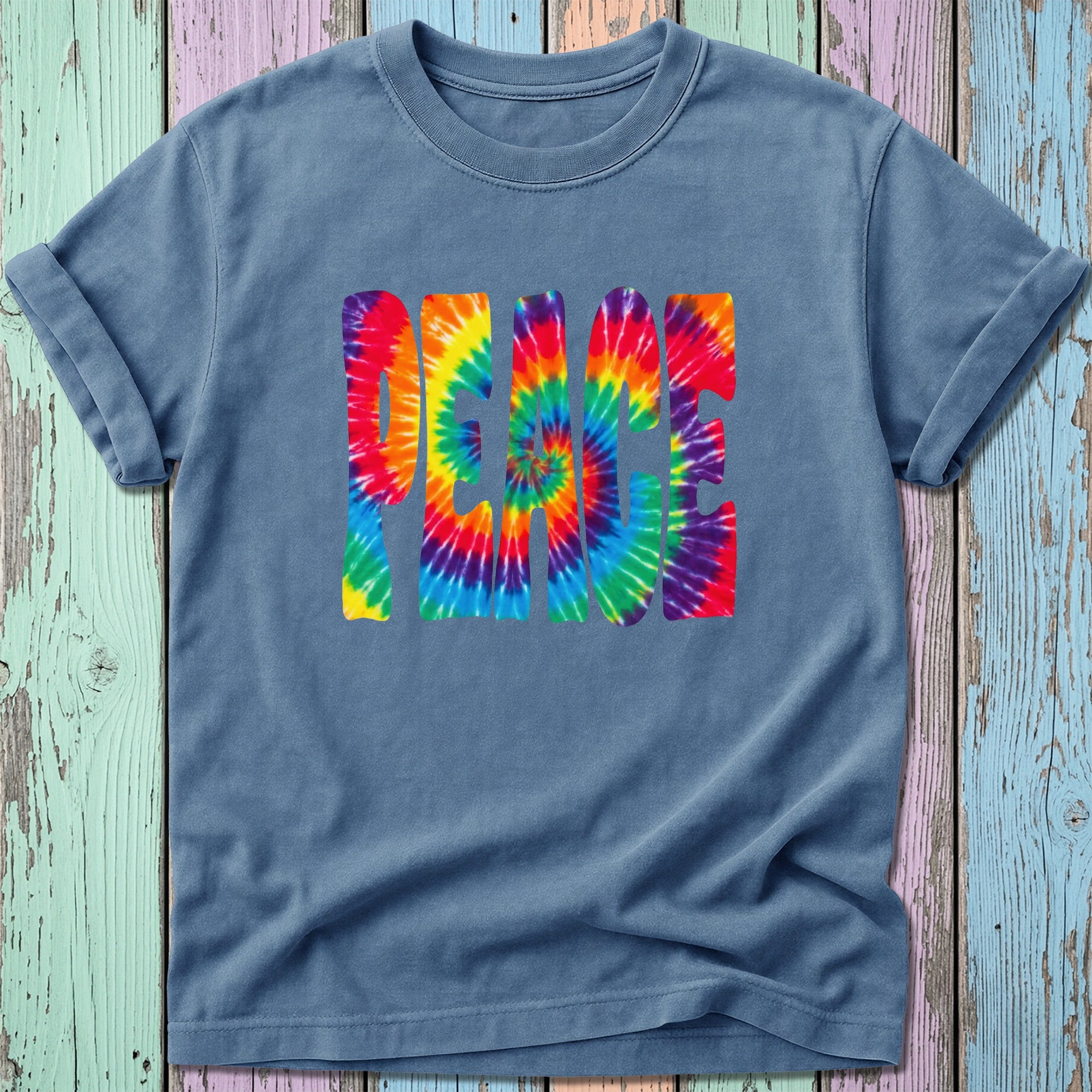 Blue tie-dye t-shirt with "PEACE" logo in rainbow colors.