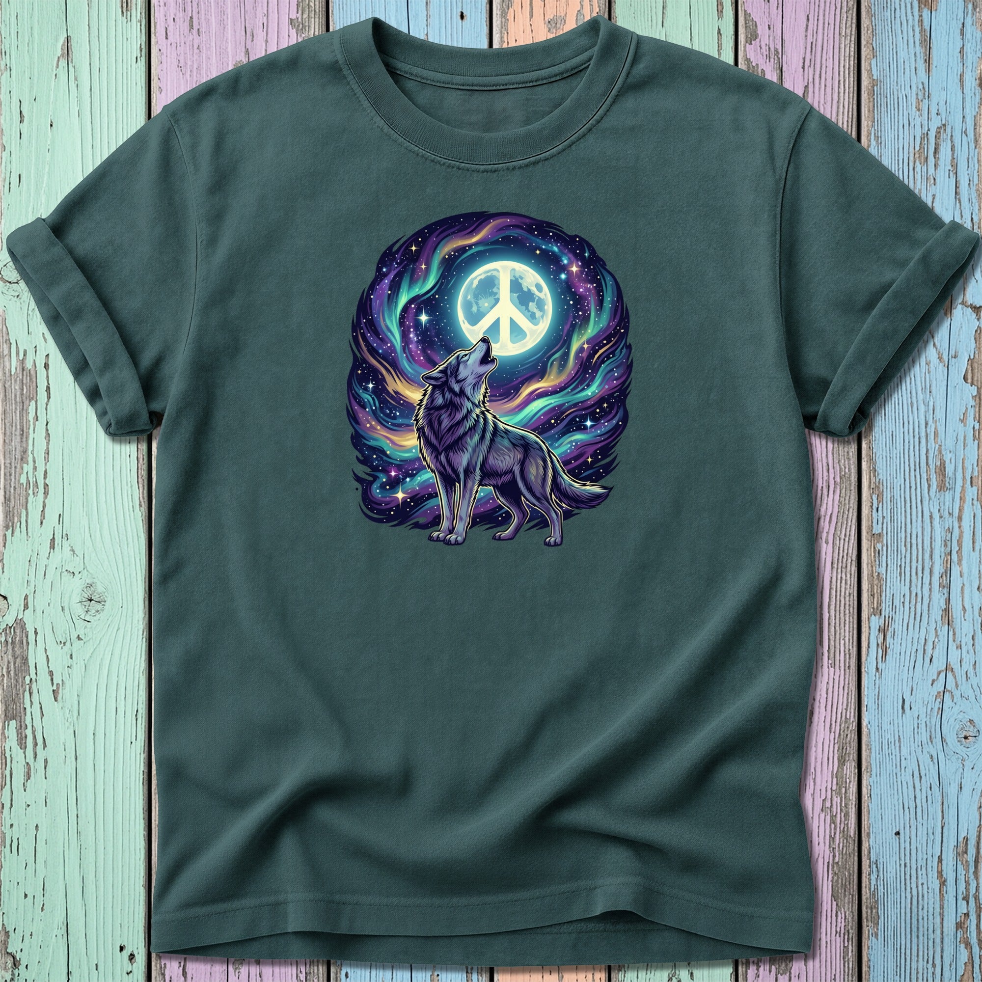 Wolf howling at a peace sign moon amidst swirling galaxy art on a dark t-shirt.
