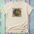 Cream t-shirt with colorful abstract peace sign and dancing figures graphic.