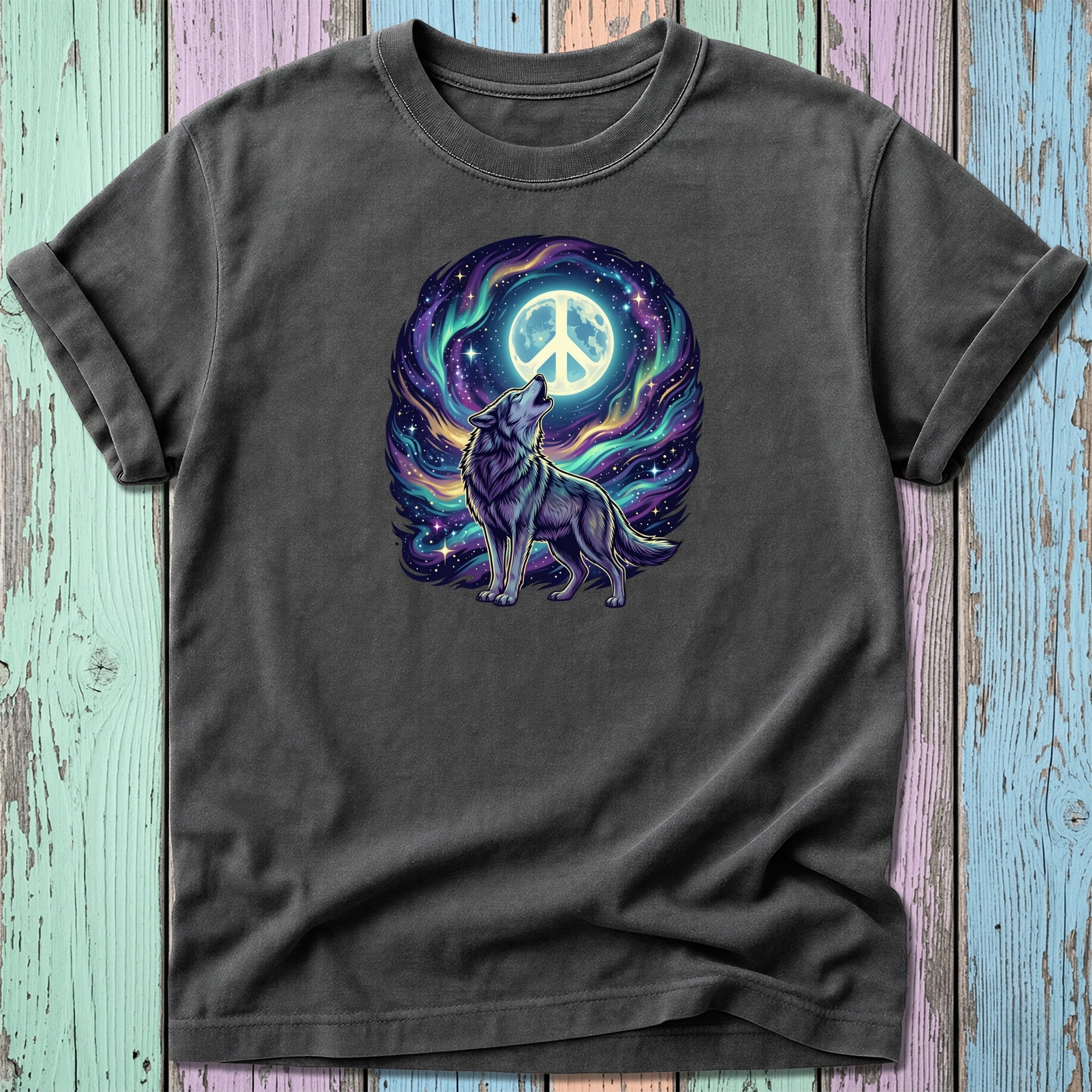 T-shirt featuring a wolf howling at a crescent moon with a peace sign.