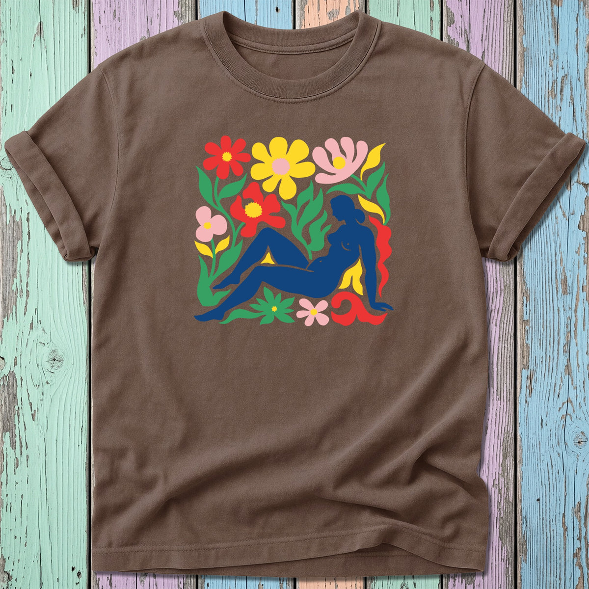 Brown t-shirt featuring a silhouette of a reclining nude woman surrounded by colorful flowers.