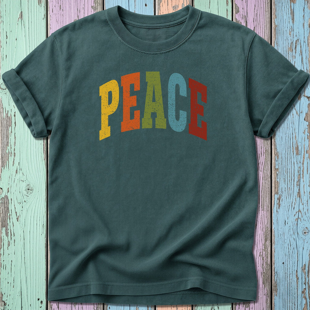 Dark green t-shirt with "PEACE" in colorful, distressed lettering.