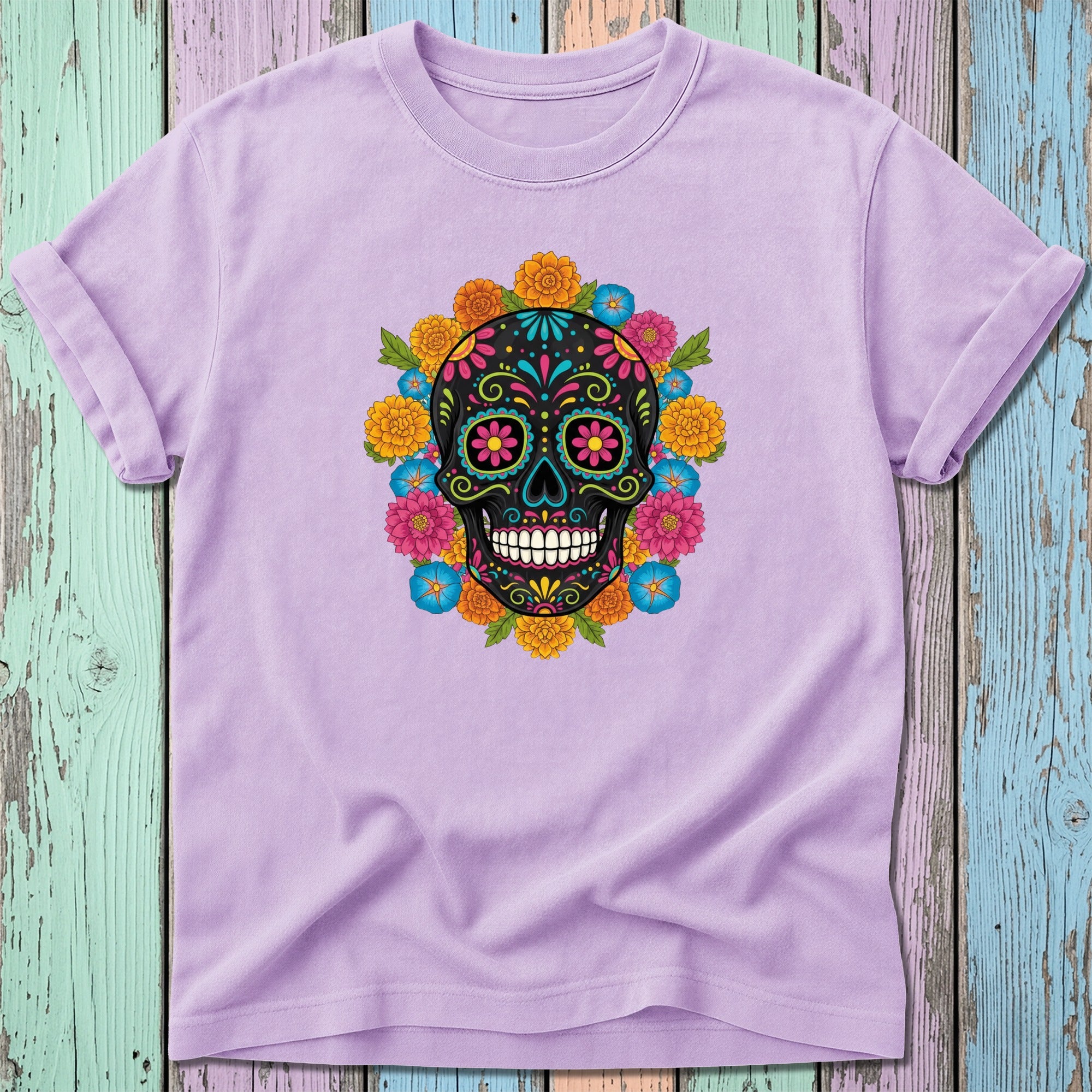 Purple t-shirt with a colorful floral sugar skull graphic.