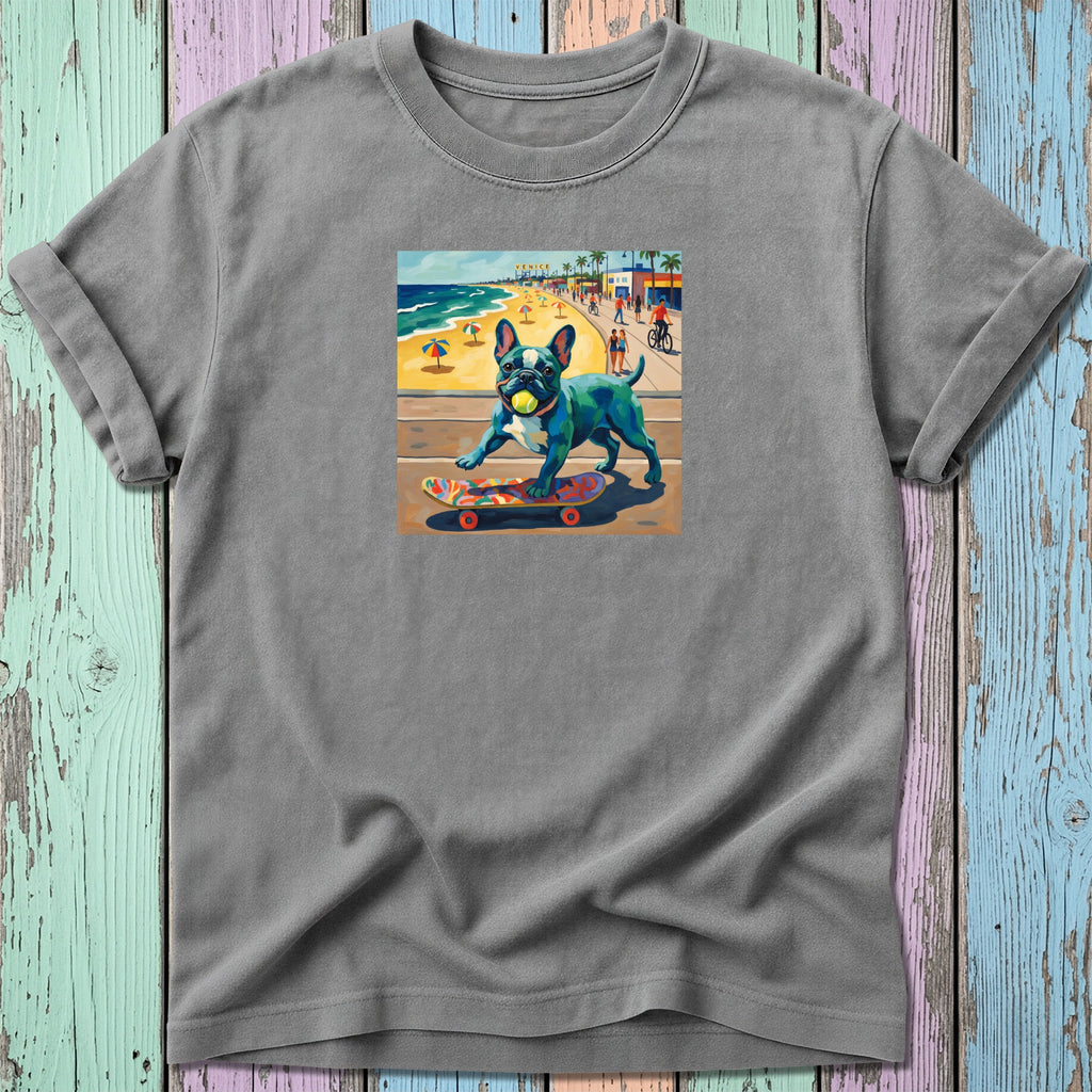 French bulldog on skateboard with beach scene, wearing yellow ball in mouth.