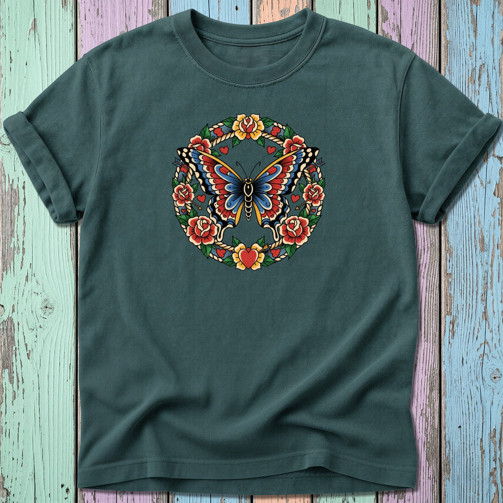 Dark green t-shirt with a circular tattoo design of a butterfly, roses, and hearts.