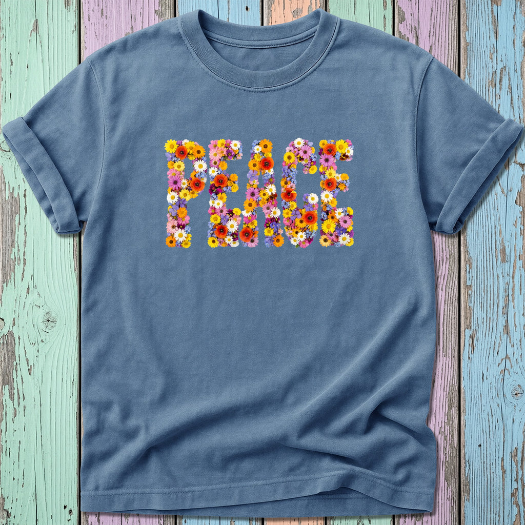 Blue t-shirt with the word PEACE spelled out in colorful flowers.