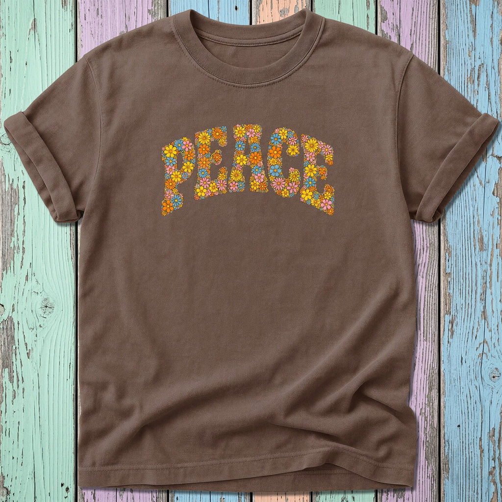 Brown t-shirt with colorful floral "Peace" graphic.
