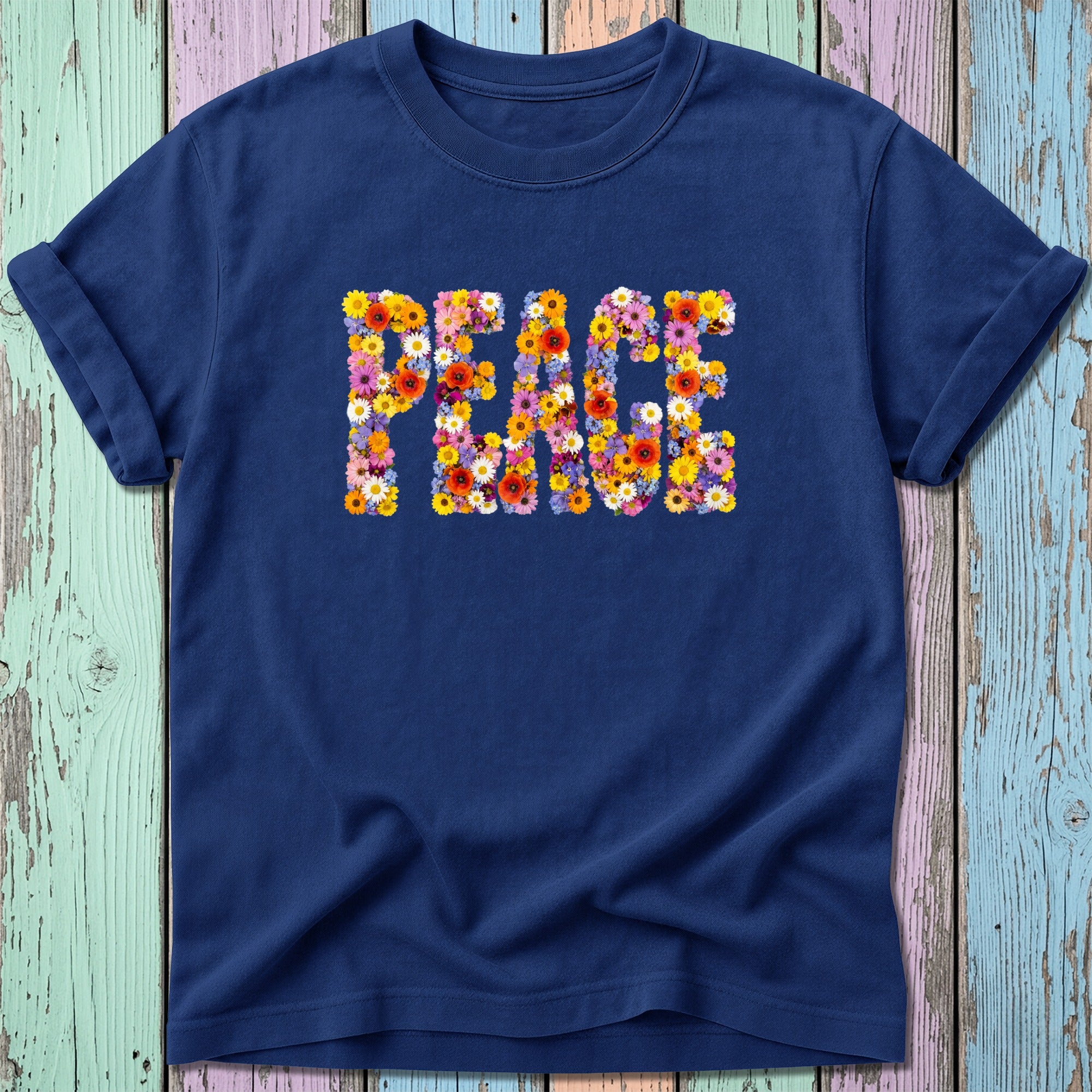 Navy t-shirt with "PEACE" spelled out in colorful floral letters.