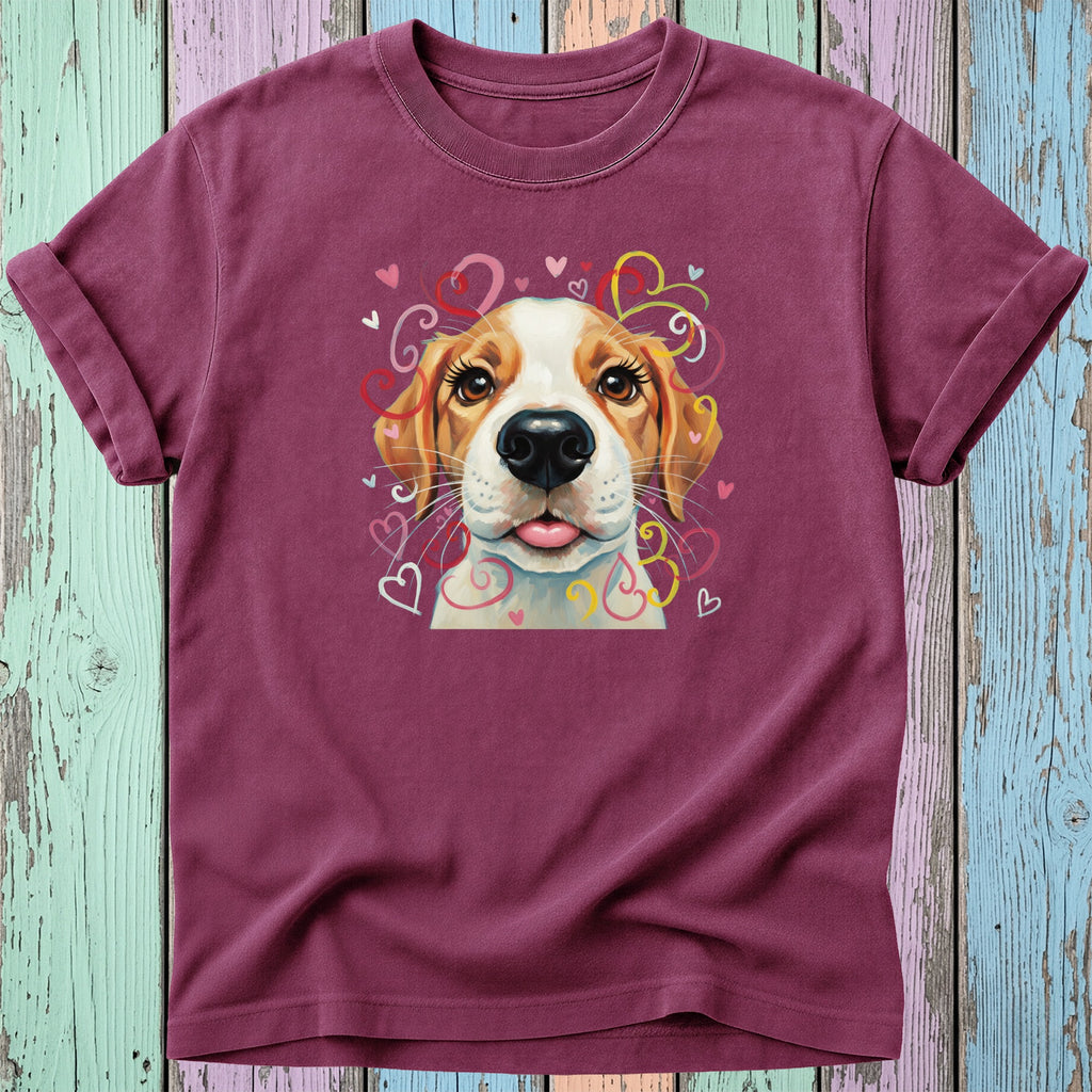 T-shirt with a colorful dog illustration surrounded by hearts.