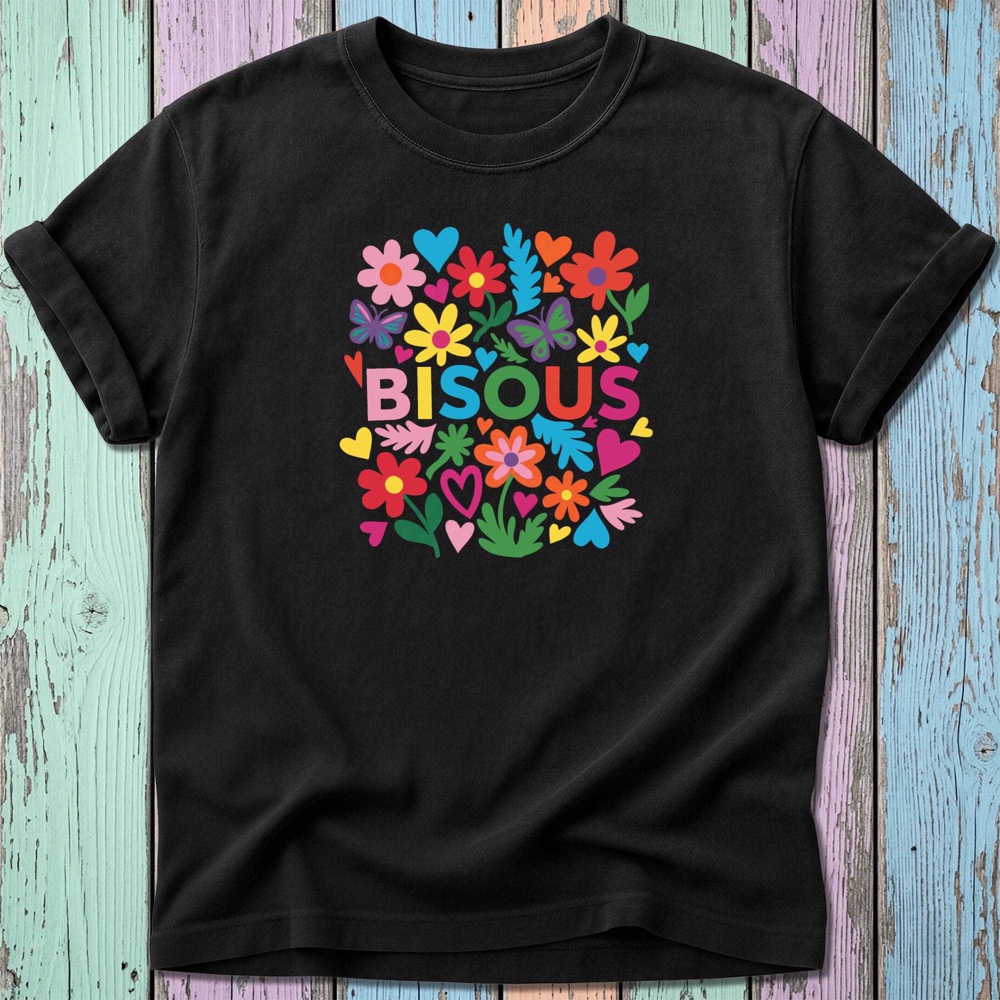 Black t-shirt with colorful floral "BISOU" text and heart graphics.