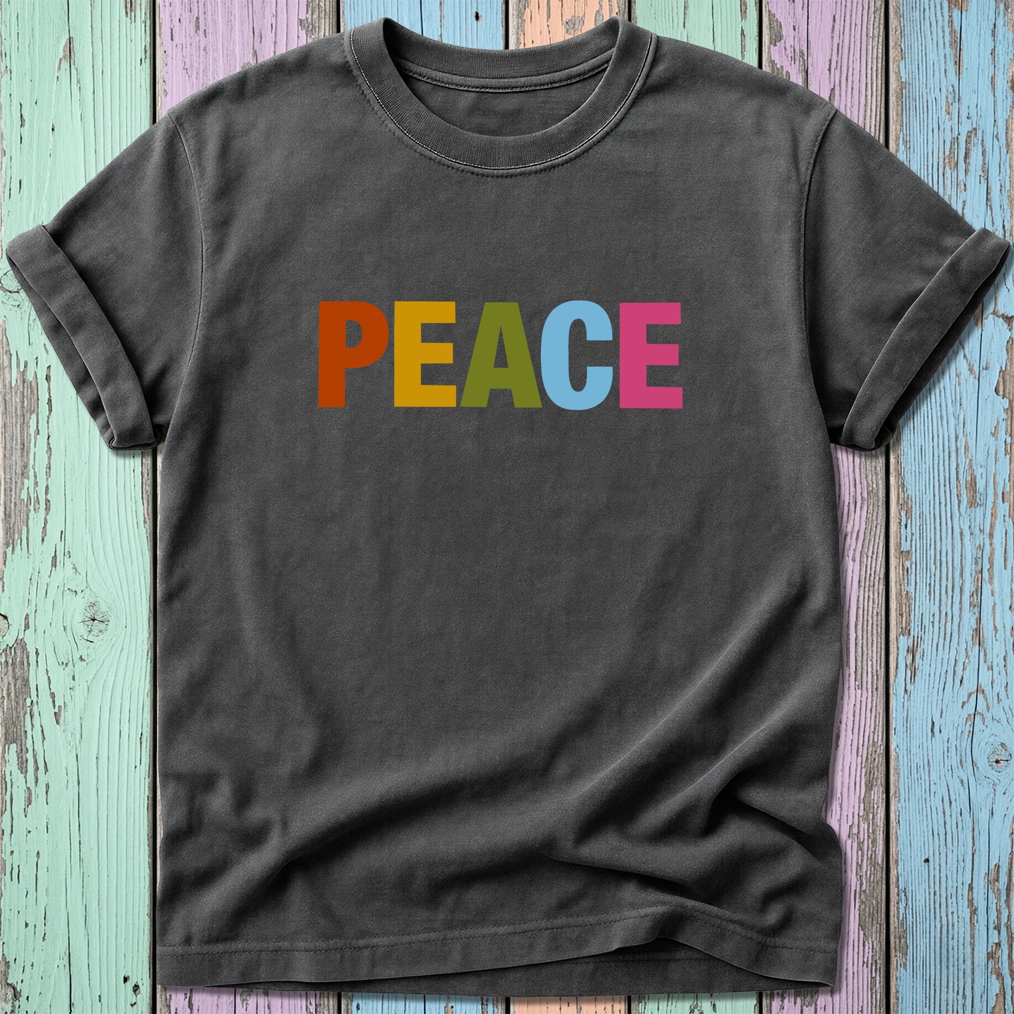 Dark gray t-shirt with colorful "PEACE" text across the chest.