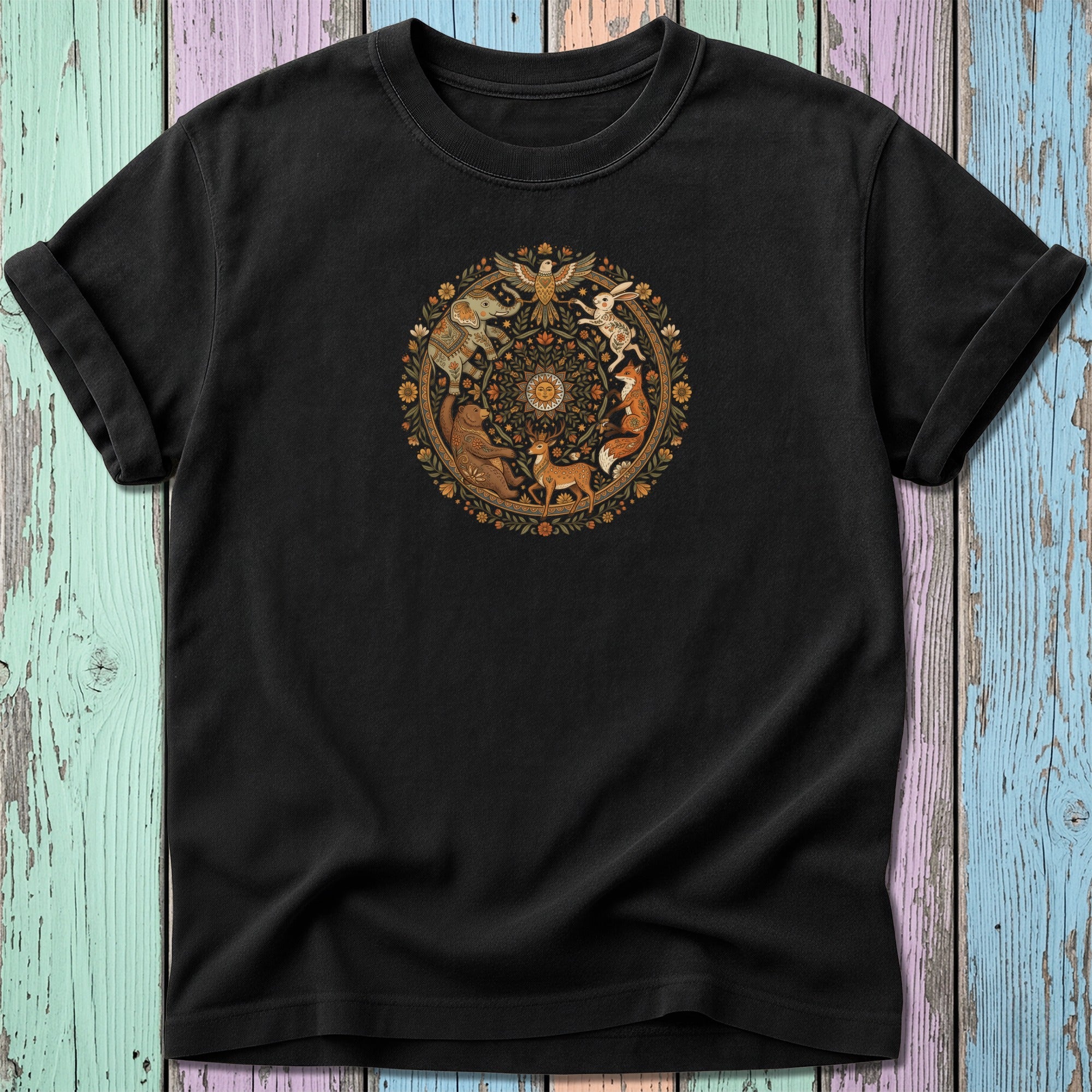 Black t-shirt with circular folk art animal design.