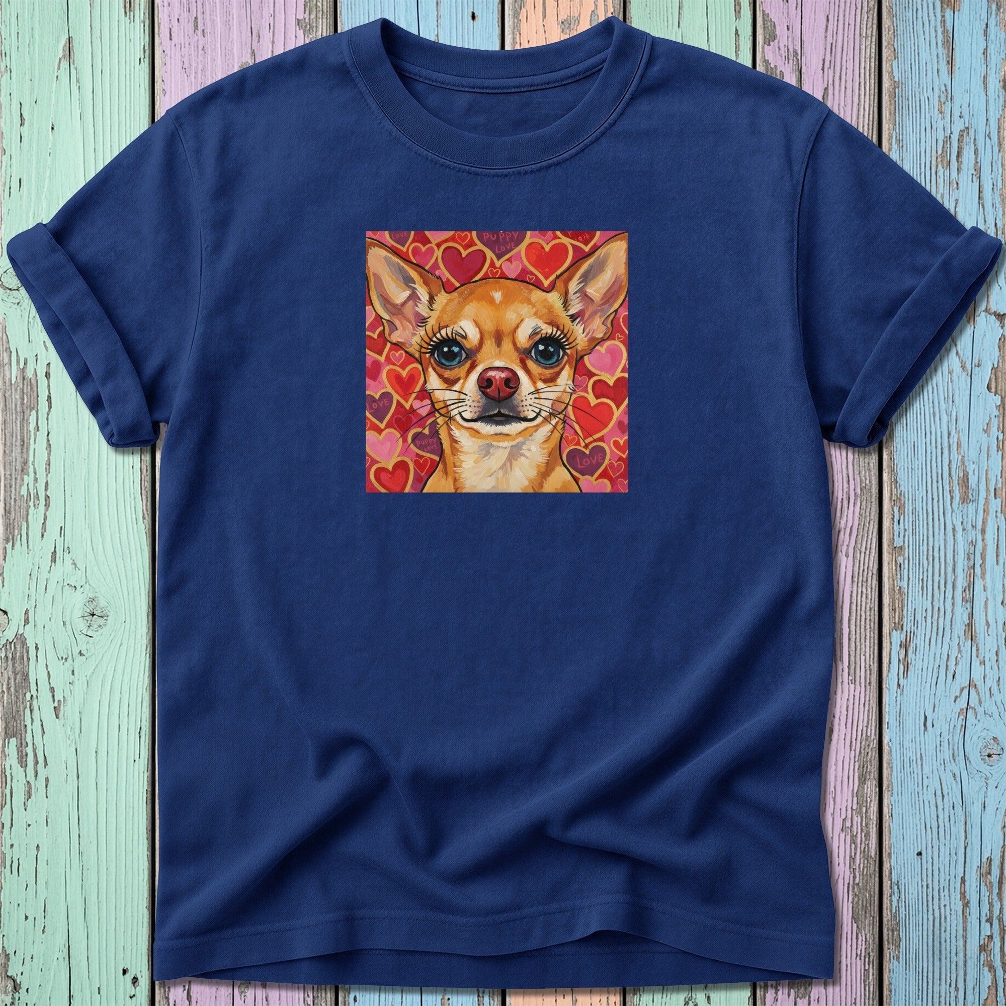 Navy t-shirt with a square graphic of a chihuahua's face surrounded by hearts.