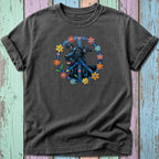 Dark t-shirt with a black dog inside a colorful peace sign.