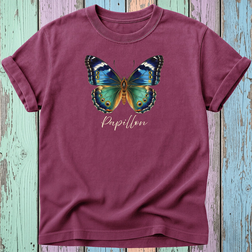 Burgundy t-shirt with a detailed blue, green, and yellow butterfly graphic and "Papillon" text.