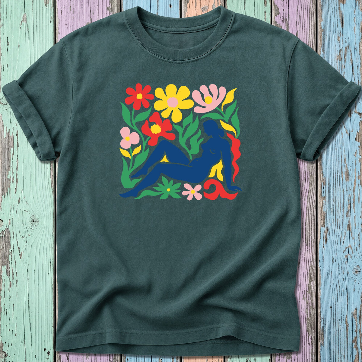 Dark green t-shirt with a colorful floral and silhouette design.