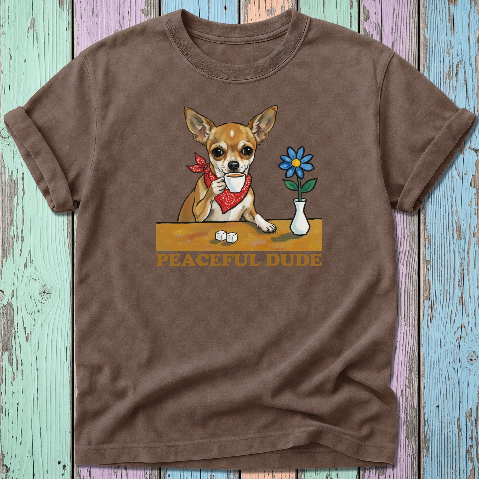 Brown t-shirt with a cartoon chihuahua wearing a bandana and drinking coffee.