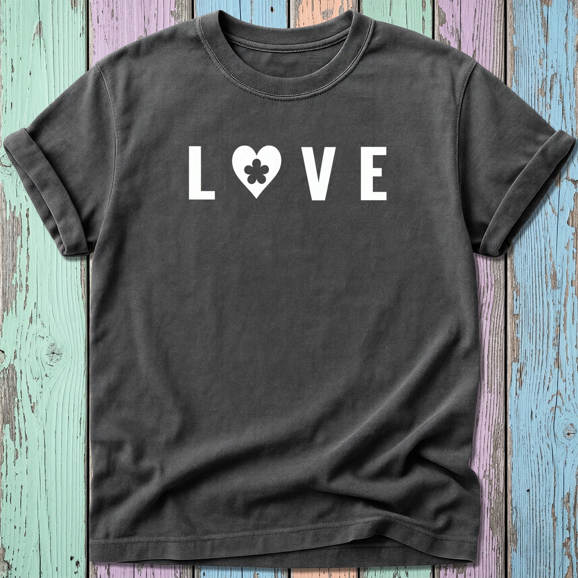 Black t-shirt with "LOVE" text and a heart with a clover inside.