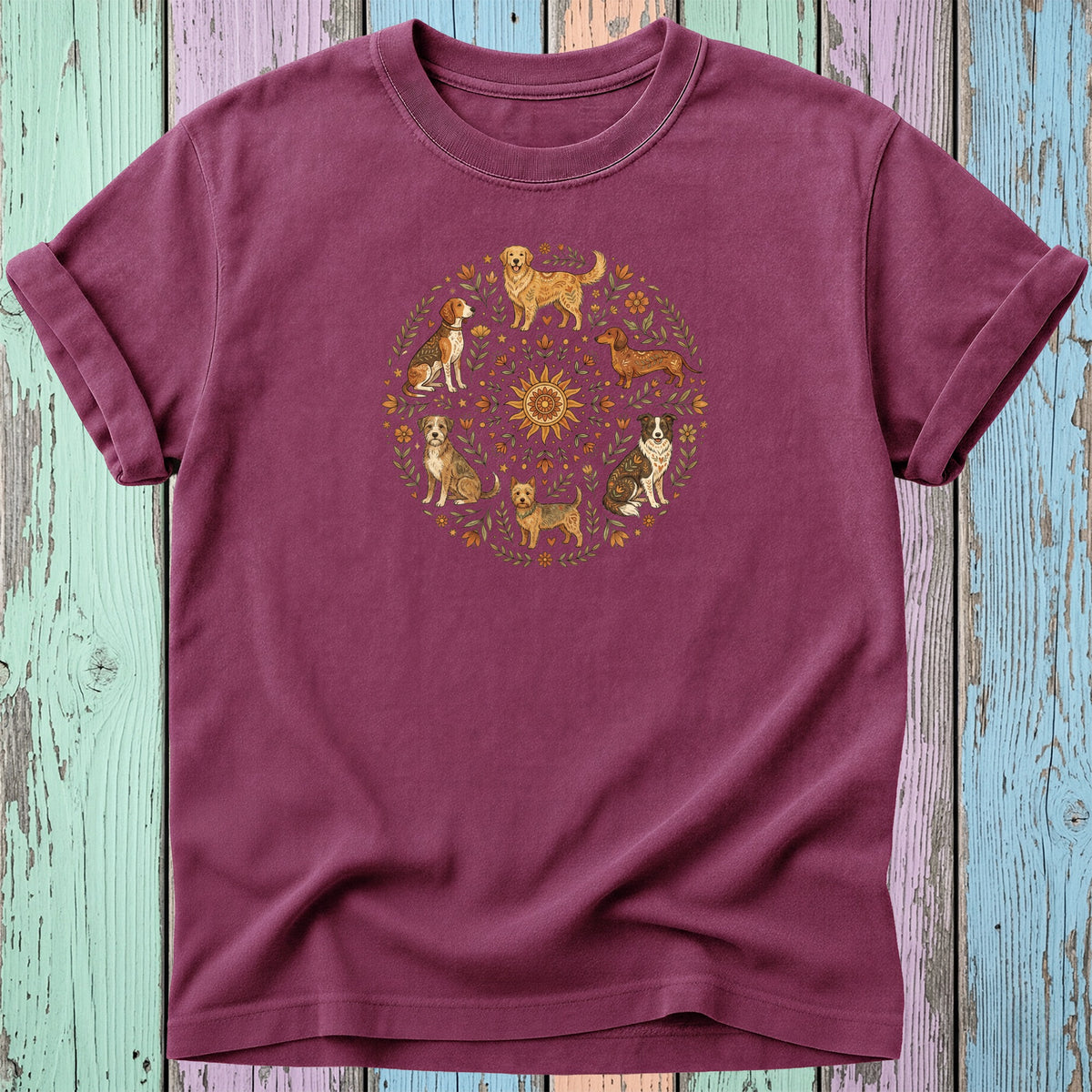 Maroon t-shirt with a circular dog and floral graphic on the chest.