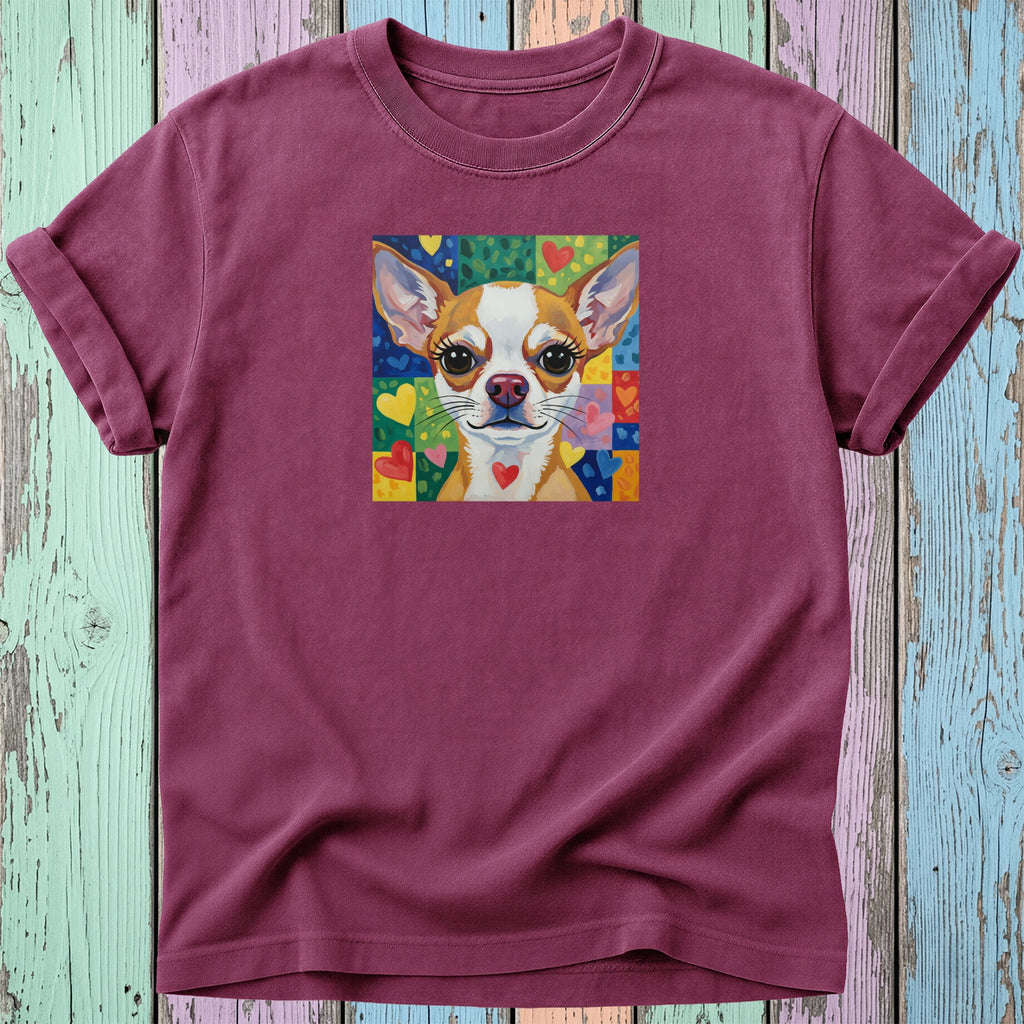 Burgundy t-shirt featuring a close-up painting of a chihuahua with colorful heart background.
